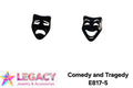 Two small black jewelry pieces shaped like theatrical masks, one with a crying face and one with a laughing face, shown on a white background with the text 'Comedy and Tragedy' and the brand name 'LEGACY Jewelry & Accessories'.