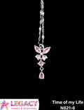 A silver-toned pendant necklace featuring a butterfly and floral design with pink gemstones, shown against a solid black background. A white banner at the bottom left displays the 'Legacy Jewelry & Accessories' logo, and text at the bottom right reads 'Time of my Life N821-6'.